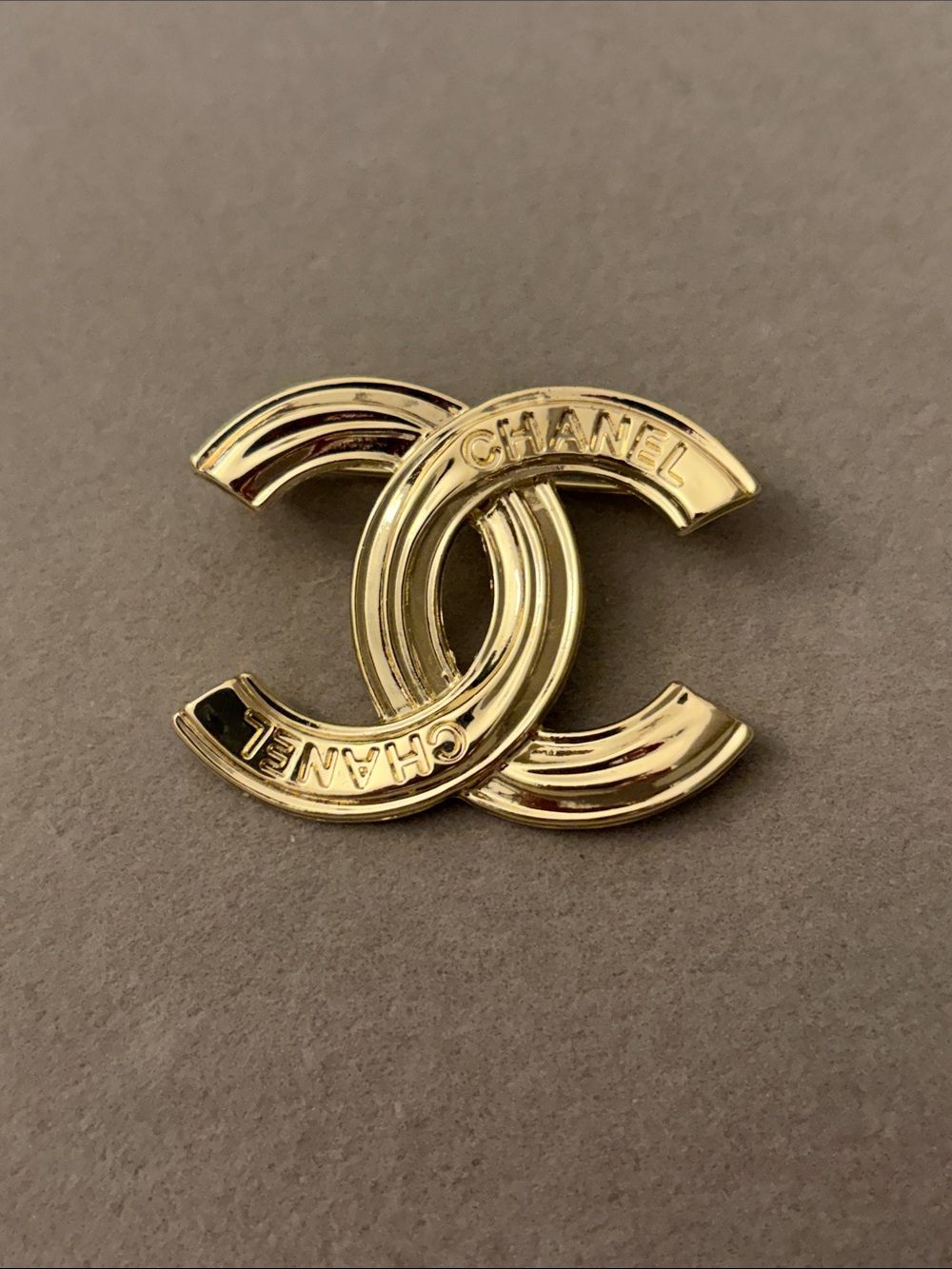 Gold-Tone Interlocking Logo Brooch